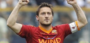 AS Roma's Totti celebrates after scoring against Parma during their Italian Serie A soccer match at the Tardini stadium in Parma