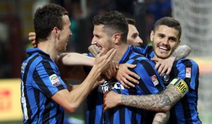 Fc Inter's forward Stevan Jovetic (center) celebrates with his teammates after scoring the lead of 2 to 1 during the Italian serie A soccer match between Fc Inter and Udinese at Giuseppe Meazza stadium in Milan, 23 April 2016. ANSA / MATTEO BAZZI