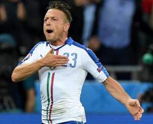 Italys Emanuele Giaccherini celebrates after scoring during the UEFA EURO 2016 group E preliminary round match between Belgium and Italy at the Stade de Lyon in Lyon, 13 June 2016. ANSA/ DANIEL DAL ZENNARO RESTRICTIONS APPLY: For editorial news reporting purposes only. Not used for commercial or marketing purposes without prior written approval of UEFA. Images must appear as still images and must not emulate match action video footage. Photographs published in online publications (whether via the Internet or otherwise) shall have an interval of at least 20 seconds between the posting