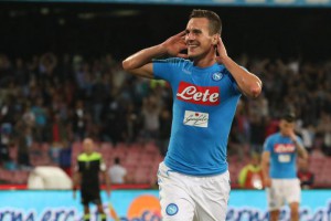 Napoli's di Arkadiusz Milik celebrates after scoring the goal of the 3-1 during the Italian Serie A soccer match between Napoli and Bologna at San Paolo Stadium in Naples, 17 September 2016. ANSA/ CESARE ABBATE