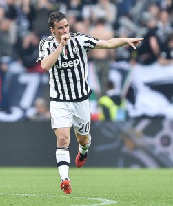 Simone Padoin of Juventus FC celebrates after scoring the 4-0 goal during Italian Serie A soccer match between Juventus Fc and Us Palermo at the Juventus stadium in Turin, 17 April 2016. ANSA / DI MARCO